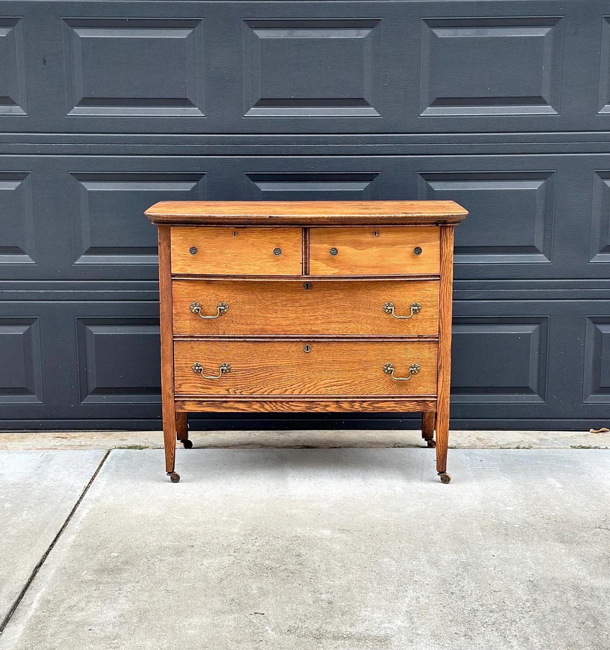 Antique Early 1900's Solid Wood Quarter Sawn Oak Four Drawer Raised Chest on Casters