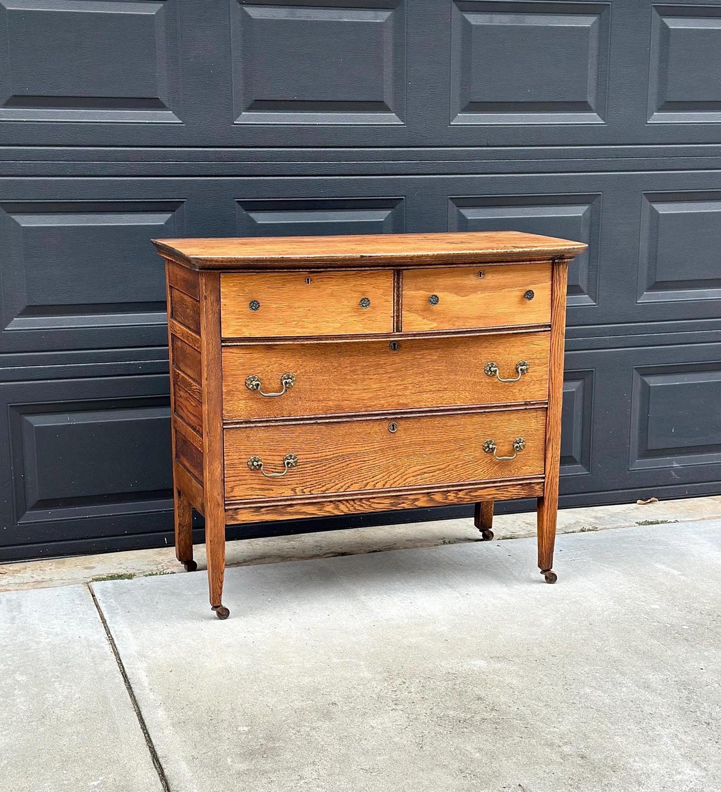 Antique Early 1900's Solid Wood Quarter Sawn Oak Four Drawer Raised Chest on Casters
