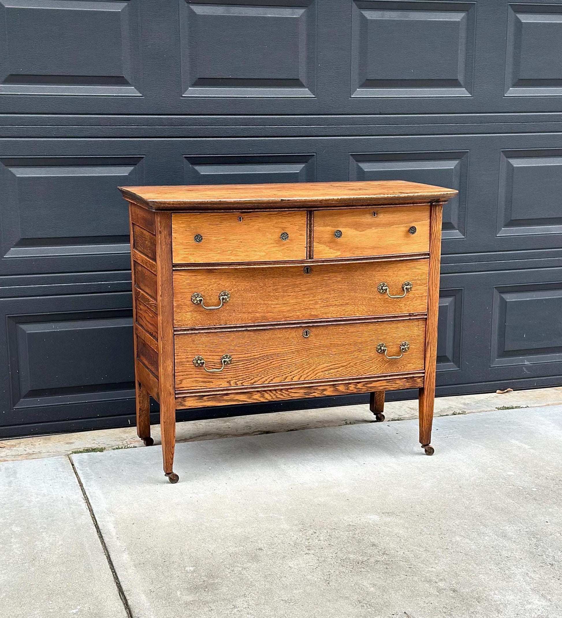 Antique Early 1900's Solid Wood Quarter Sawn Oak Four Drawer Raised Chest on Casters