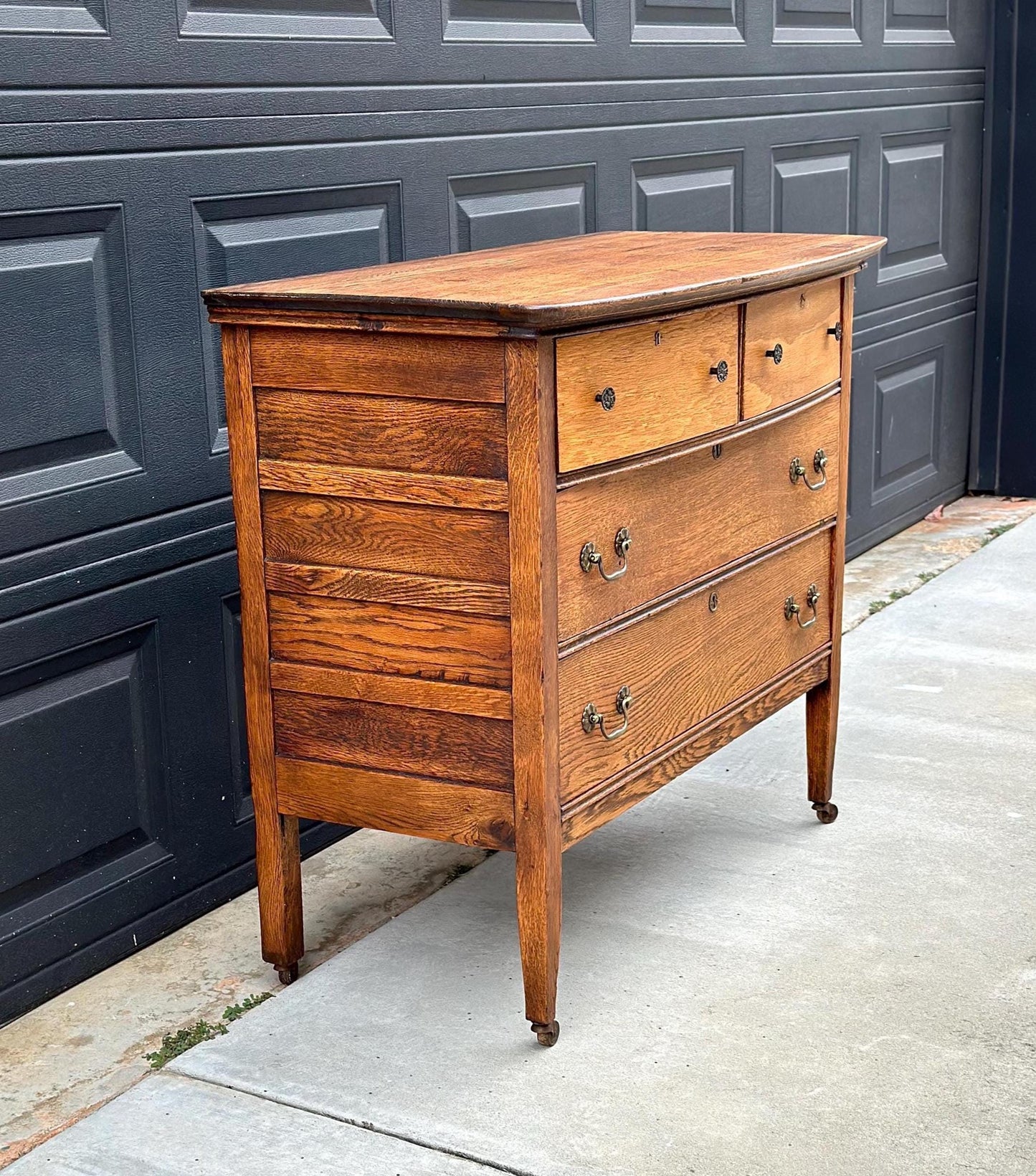 Antique Early 1900's Solid Wood Quarter Sawn Oak Four Drawer Raised Chest on Casters