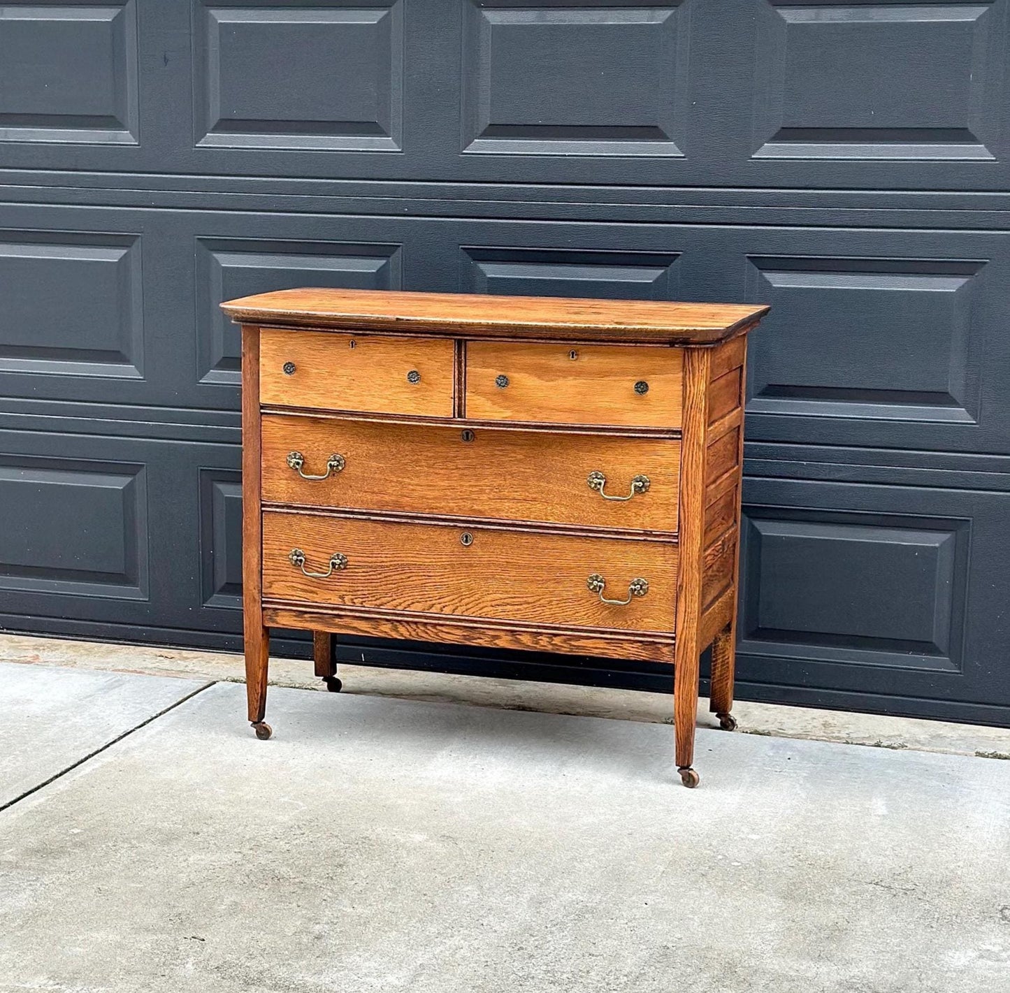 Antique Early 1900's Solid Wood Quarter Sawn Oak Four Drawer Raised Chest on Casters