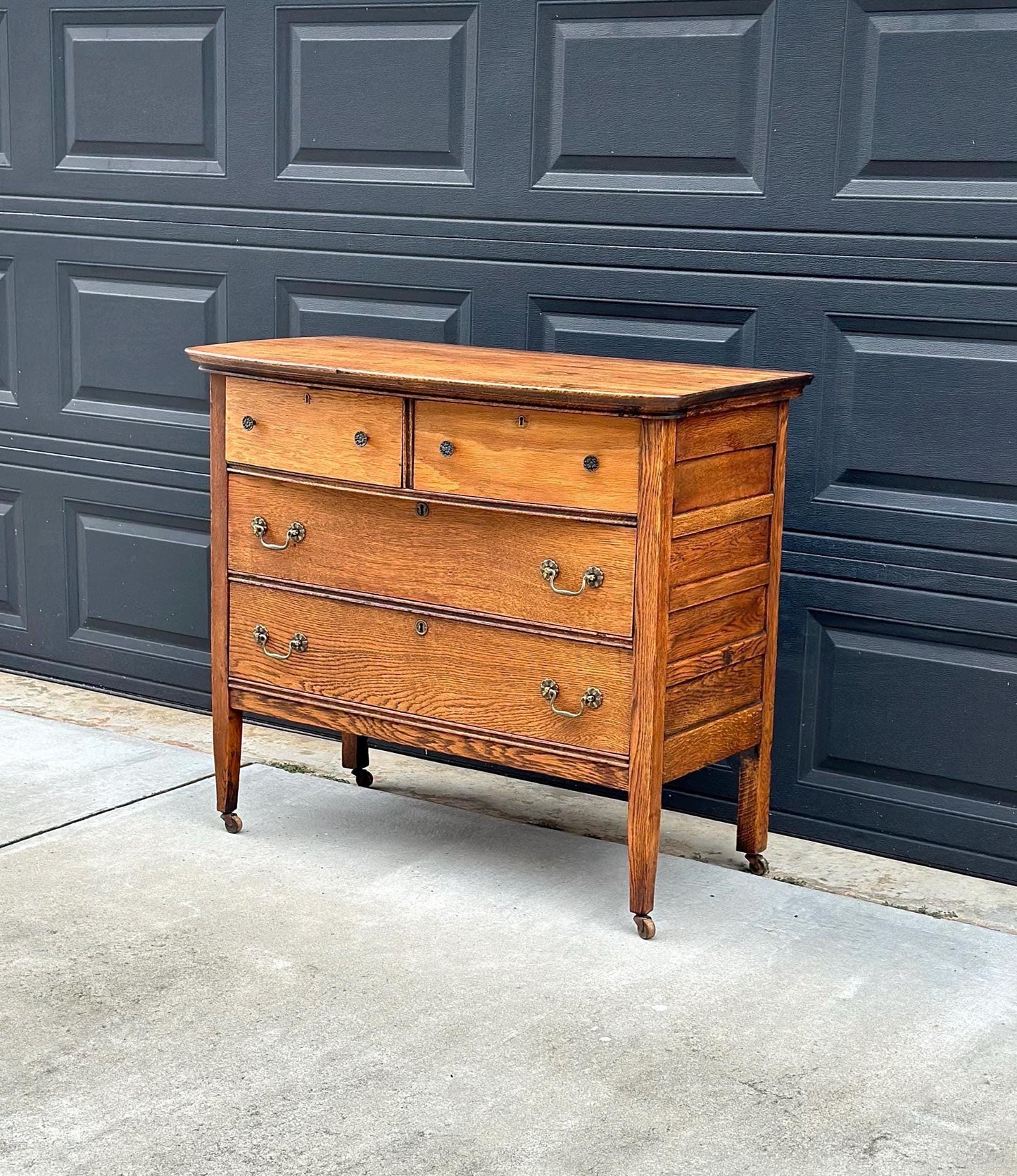 Antique Early 1900's Solid Wood Quarter Sawn Oak Four Drawer Raised Chest on Casters