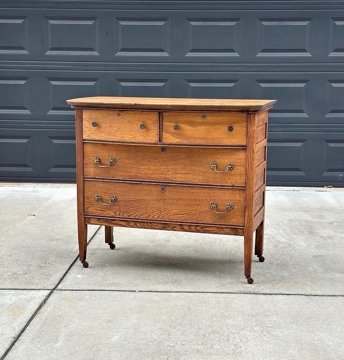 Antique Early 1900's Solid Wood Quarter Sawn Oak Four Drawer Raised Chest on Casters