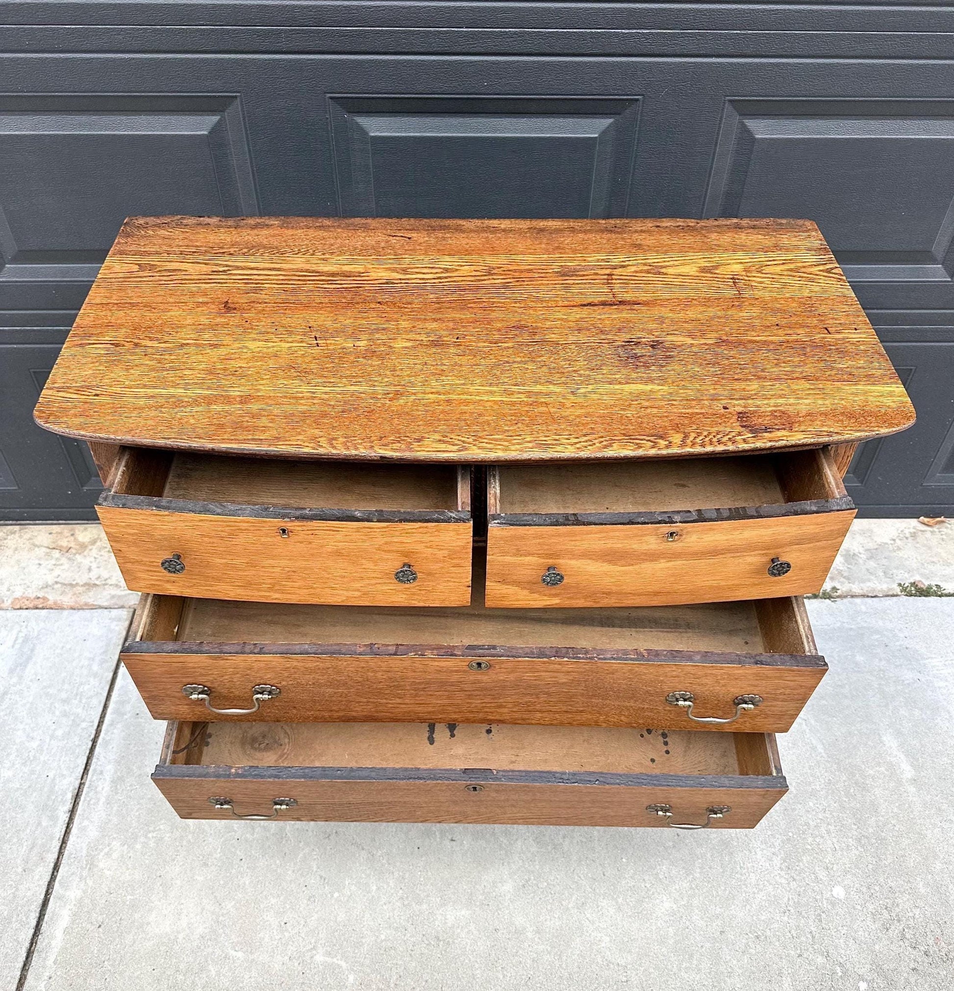 Antique Early 1900's Solid Wood Quarter Sawn Oak Four Drawer Raised Chest on Casters