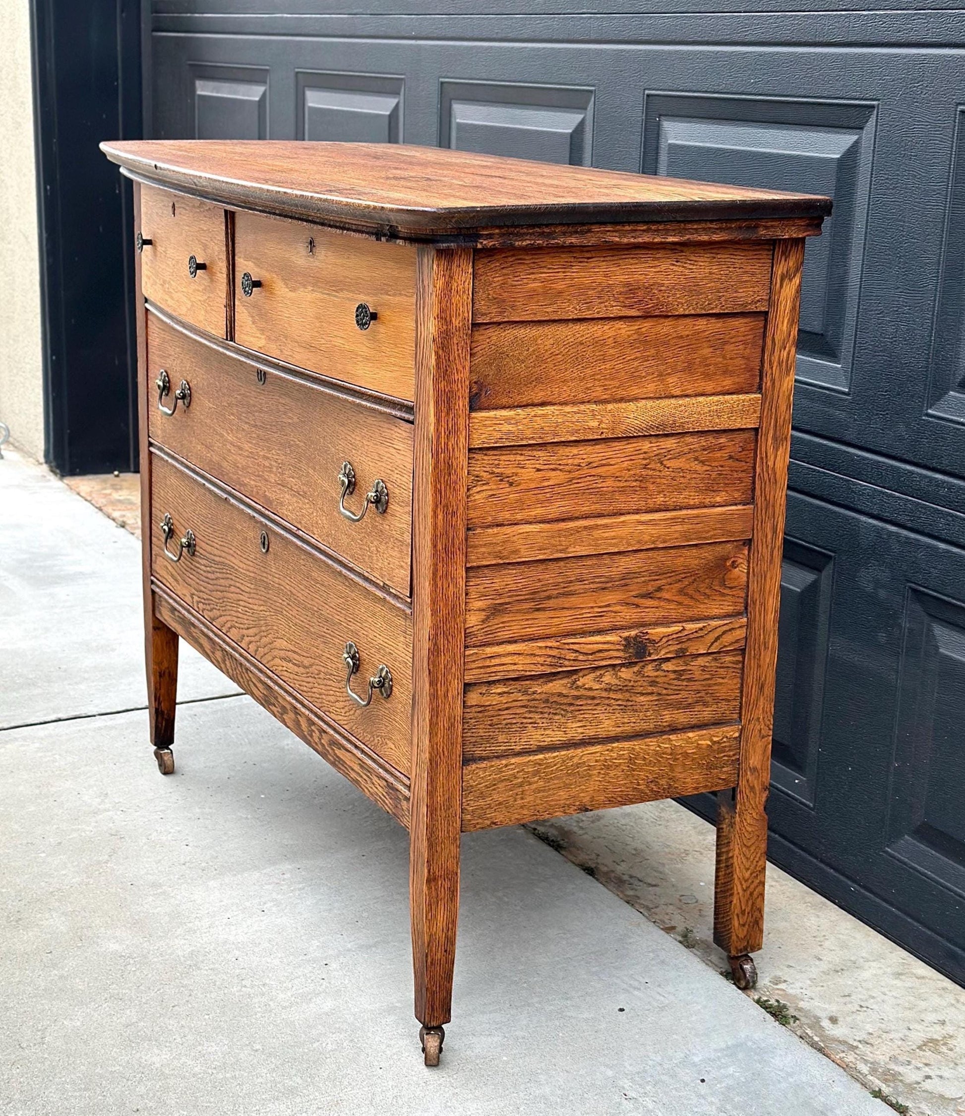 Antique Early 1900's Solid Wood Quarter Sawn Oak Four Drawer Raised Chest on Casters