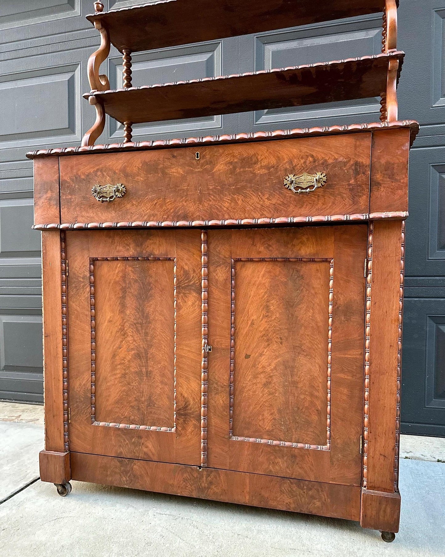 Antique Mid 1800's Victorian Flame Mahogany Wood Chiffonier Cabinet with Bobbin Bookshelf on Casters