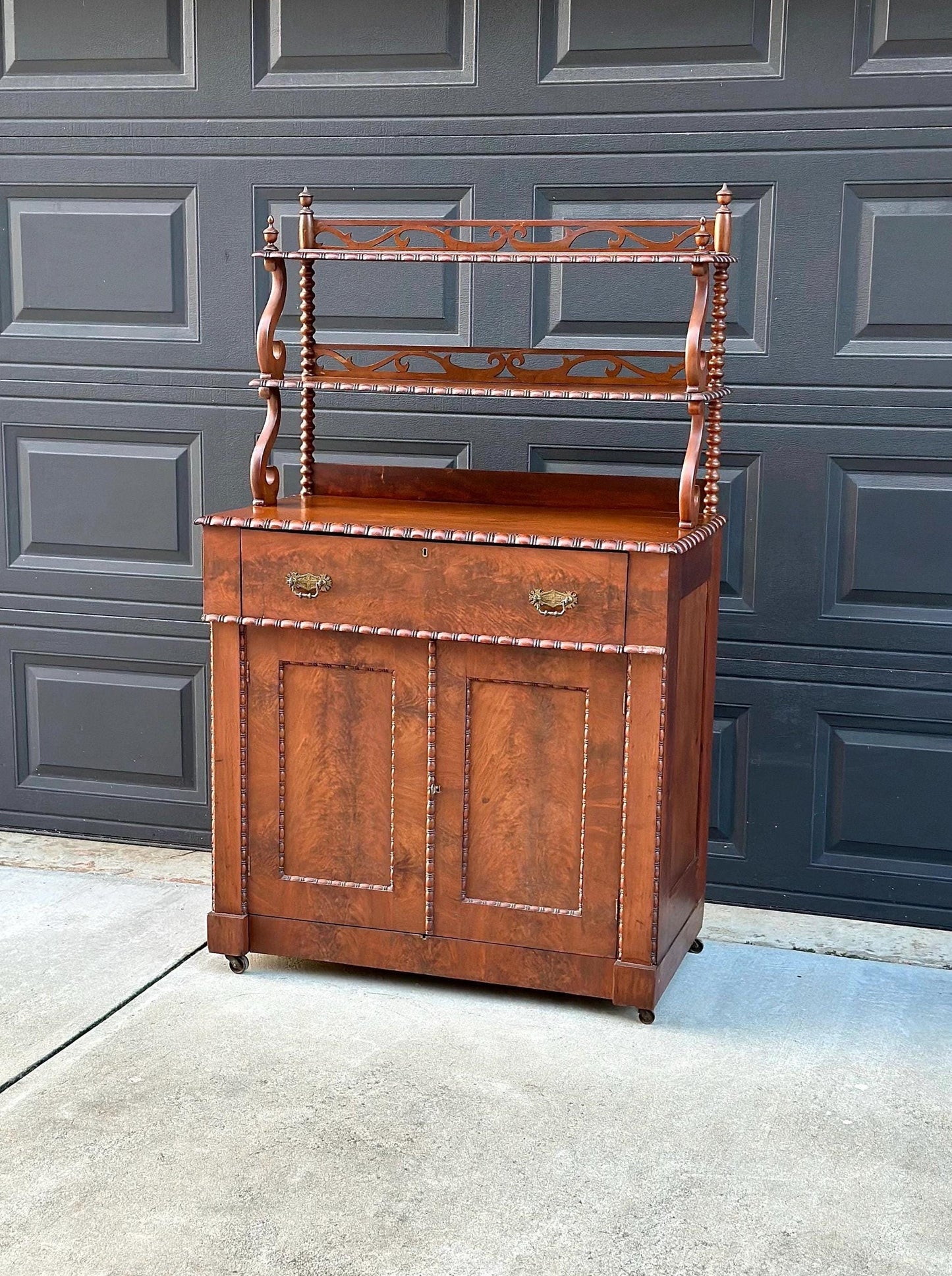 Antique Mid 1800's Victorian Flame Mahogany Wood Chiffonier Cabinet with Bobbin Bookshelf on Casters