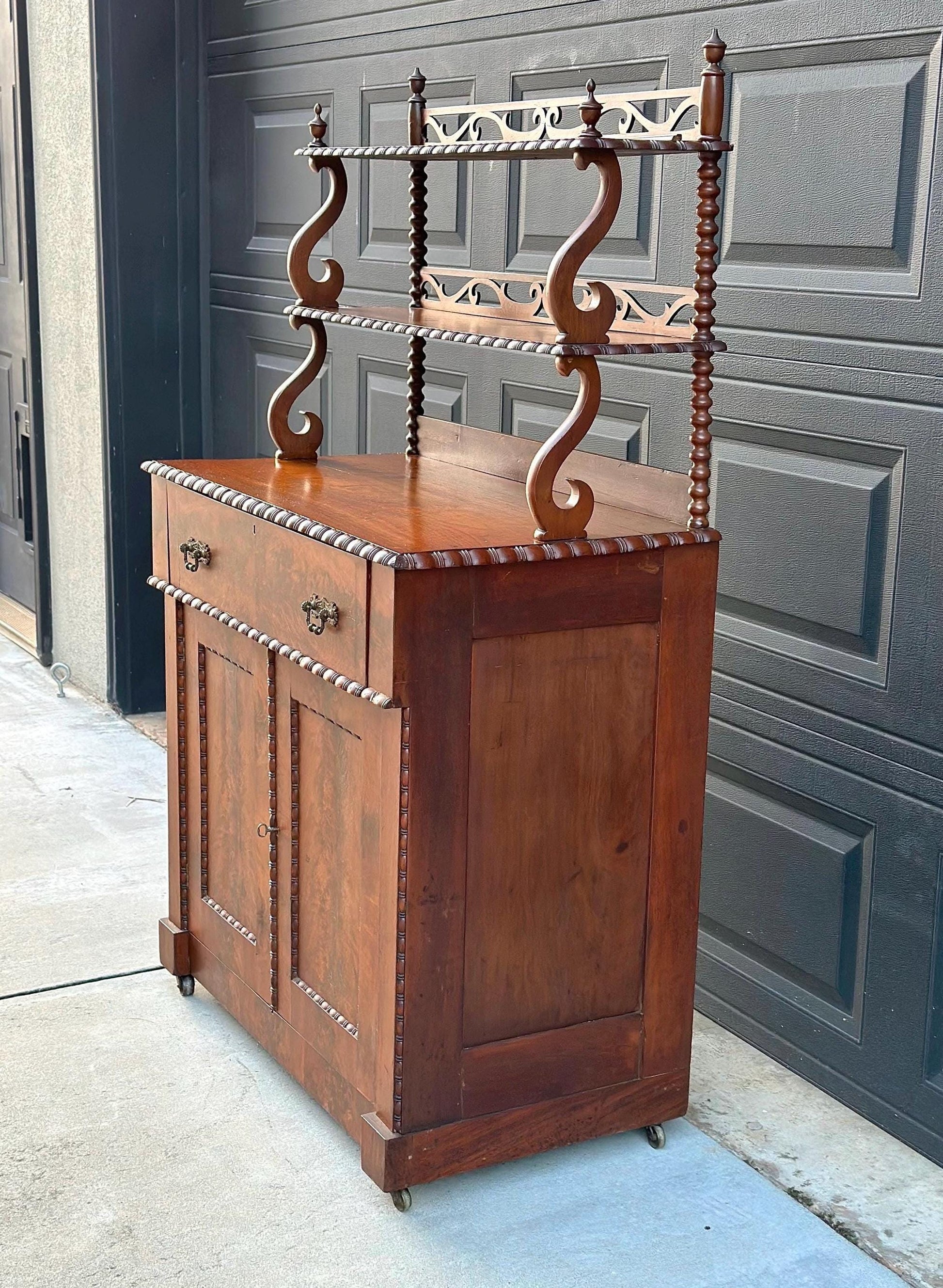 Antique Mid 1800's Victorian Flame Mahogany Wood Chiffonier Cabinet with Bobbin Bookshelf on Casters