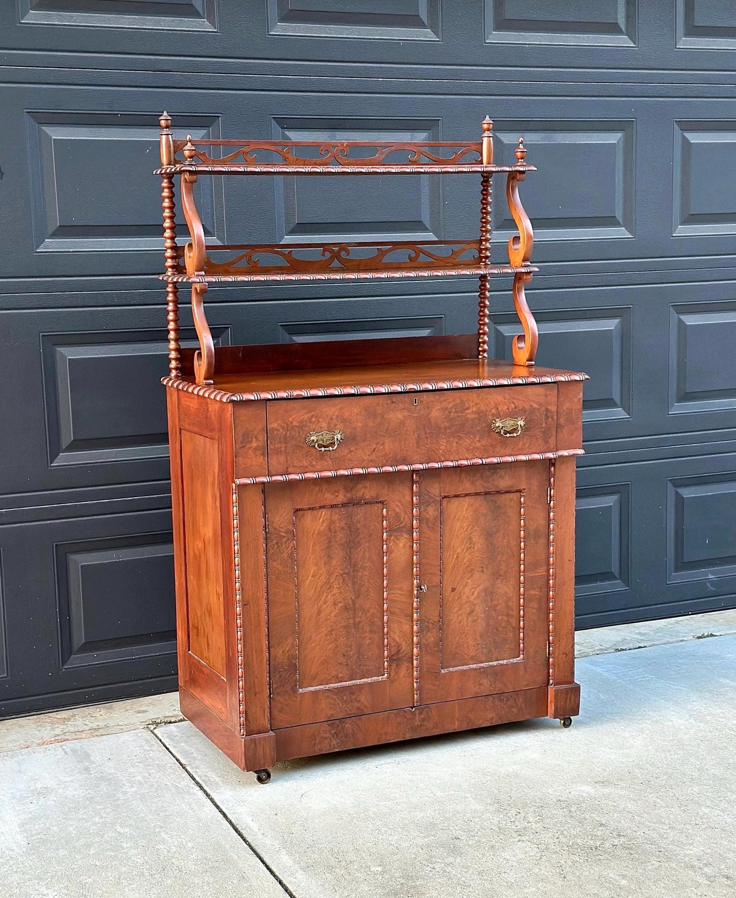 Antique Mid 1800's Victorian Flame Mahogany Wood Chiffonier Cabinet with Bobbin Bookshelf on Casters