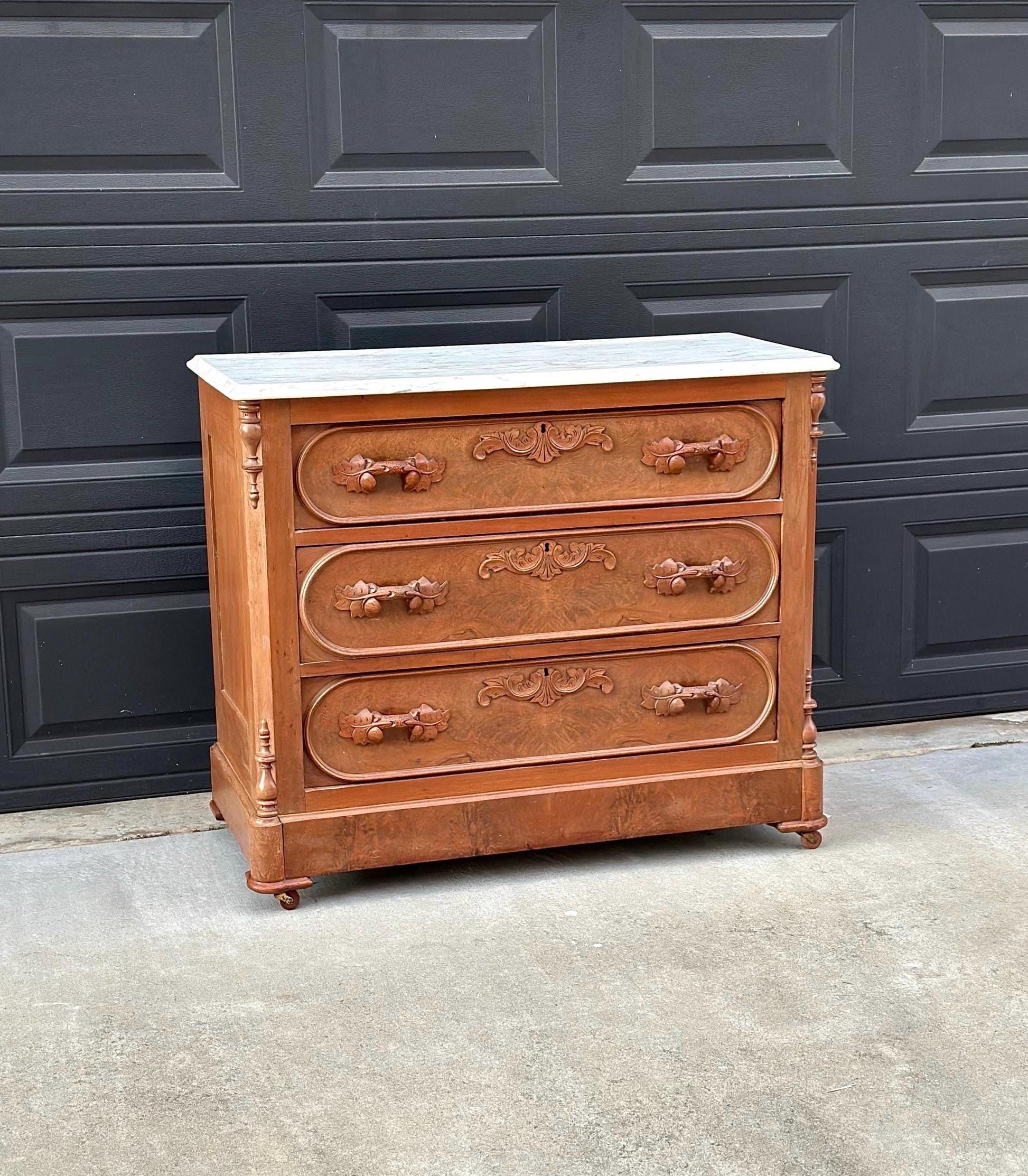 Antique Late 1800's Bookmatched Walnut Wood & White Marble Three Drawer Victorian Dresser on Casters