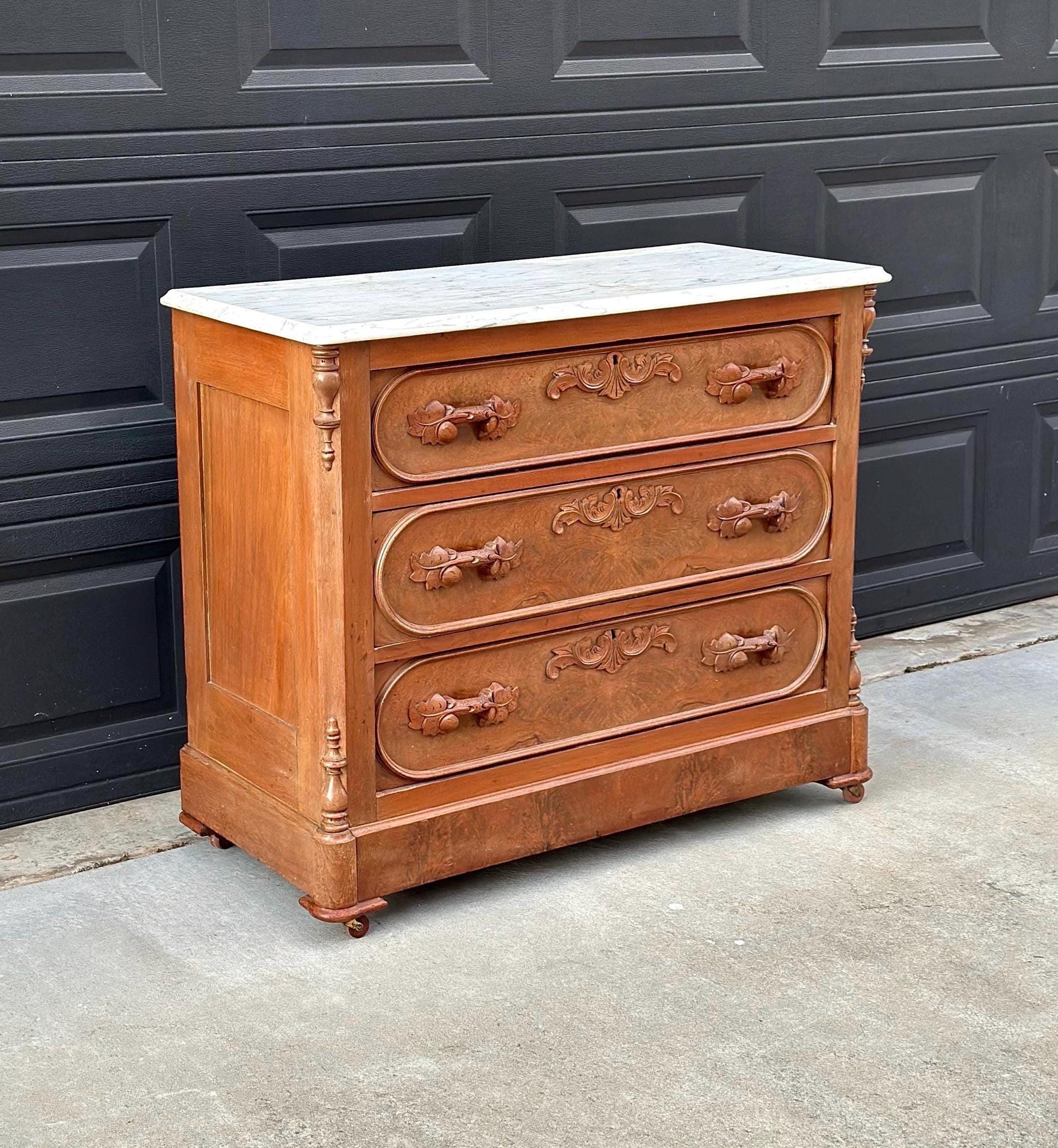 Antique Late 1800's Bookmatched Walnut Wood & White Marble Three Drawer Victorian Dresser on Casters