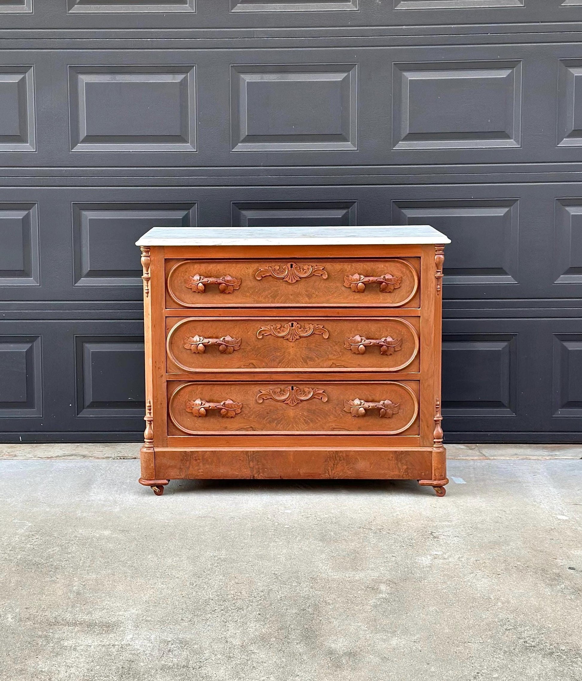 Antique Late 1800's Bookmatched Walnut Wood & White Marble Three Drawer Victorian Dresser on Casters