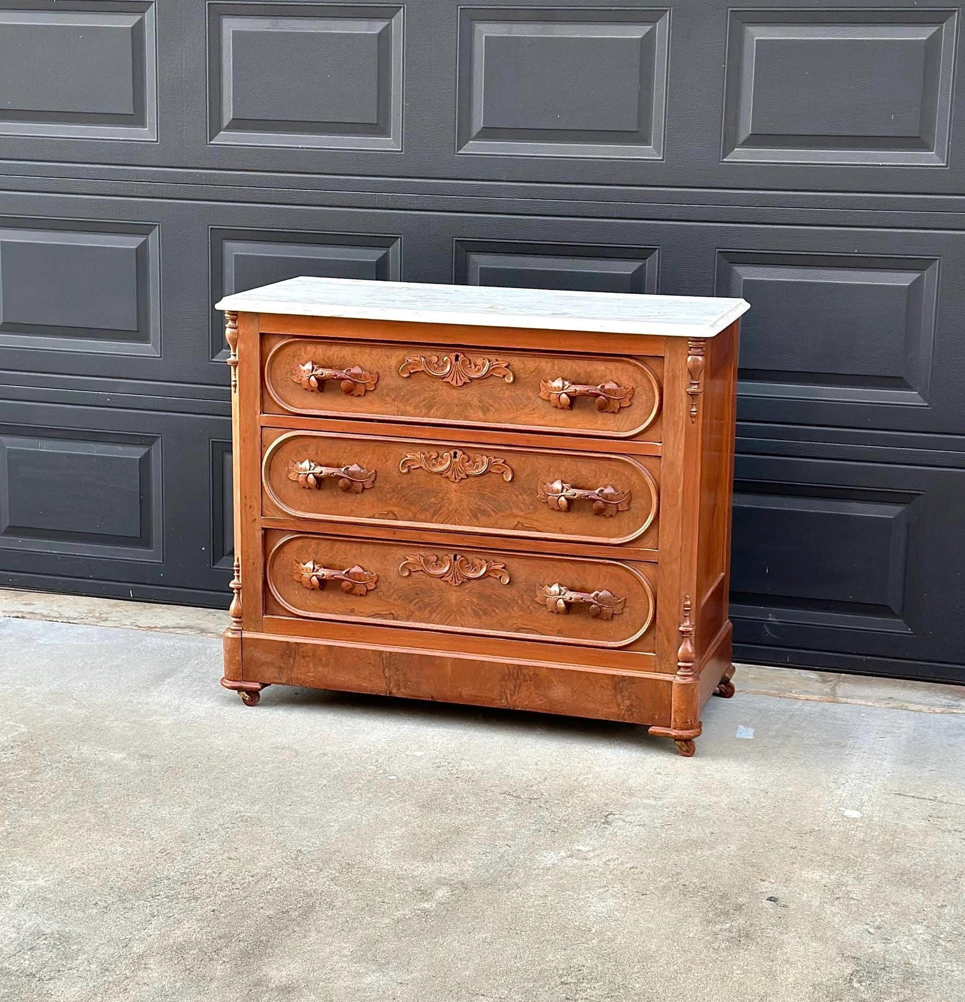 Antique Late 1800's Bookmatched Walnut Wood & White Marble Three Drawer Victorian Dresser on Casters