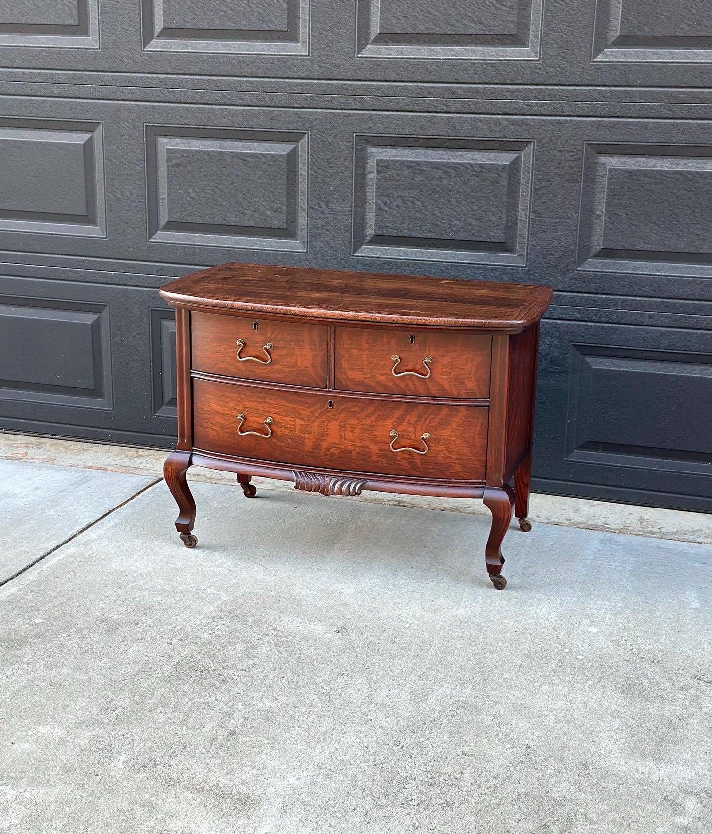 Antique Early 1900's Tiger Oak Georgian Solid Wood Low Bowfront Accent Table on Casters