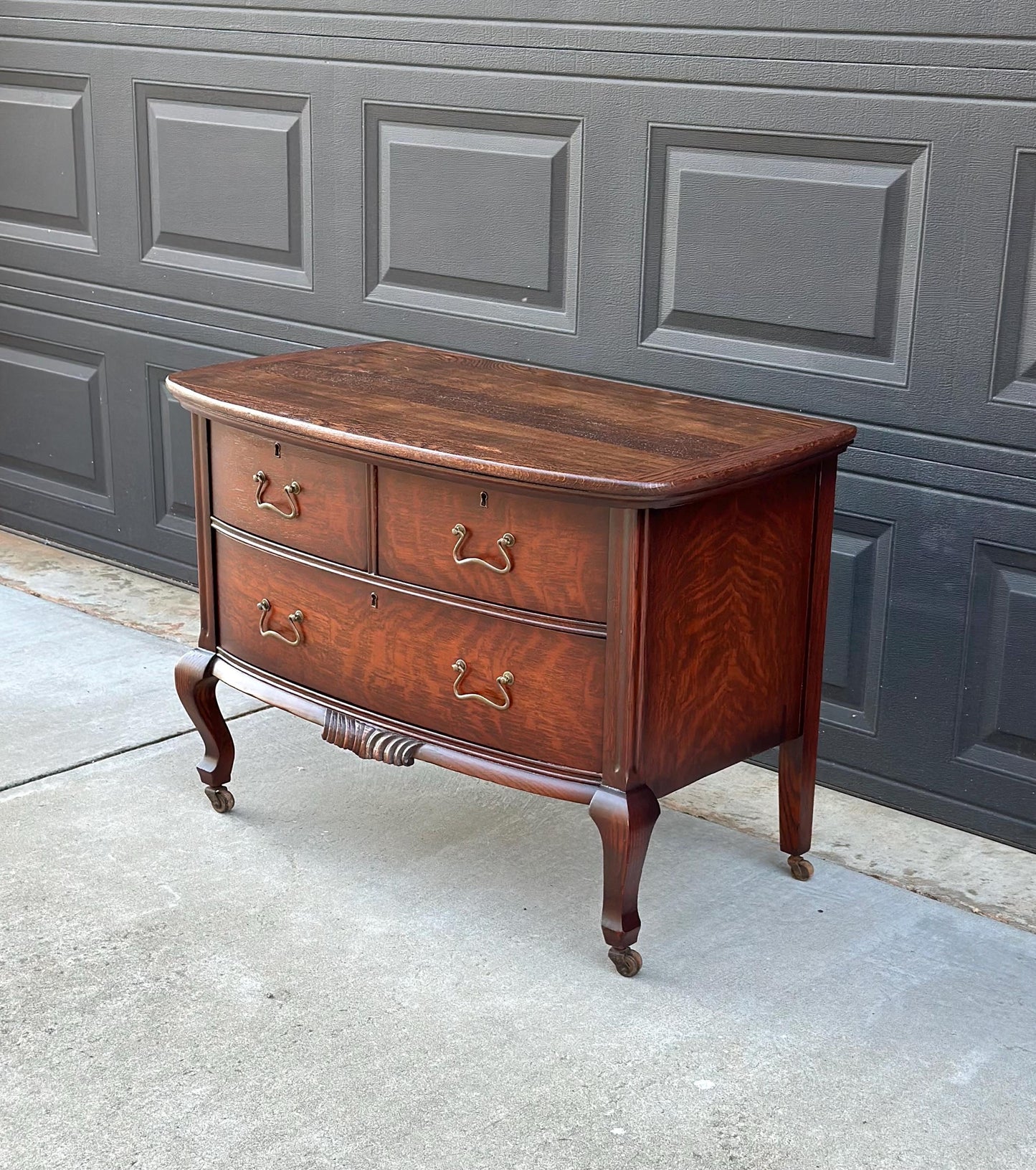 Antique Early 1900's Tiger Oak Georgian Solid Wood Low Bowfront Accent Table on Casters