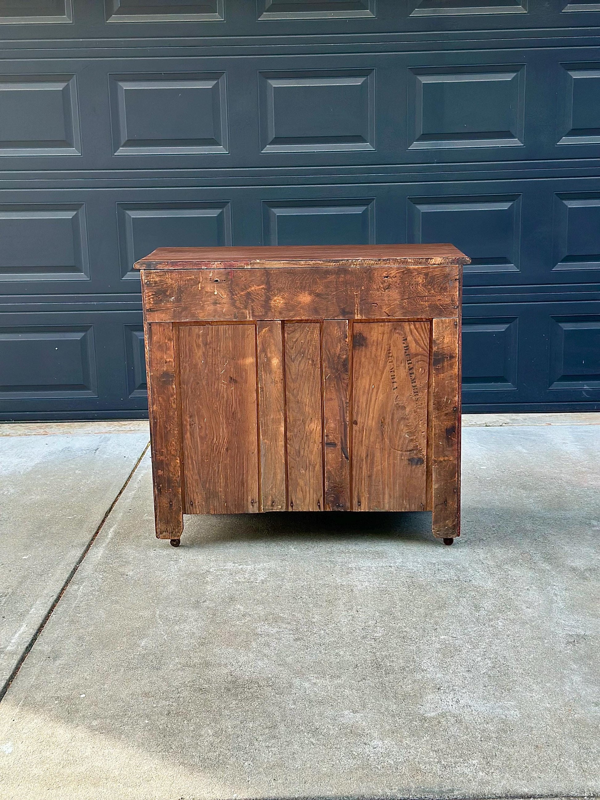 Vintage Late 19th Century Solid Wood Carved Walnut Rustic Storage Dresser on Casters