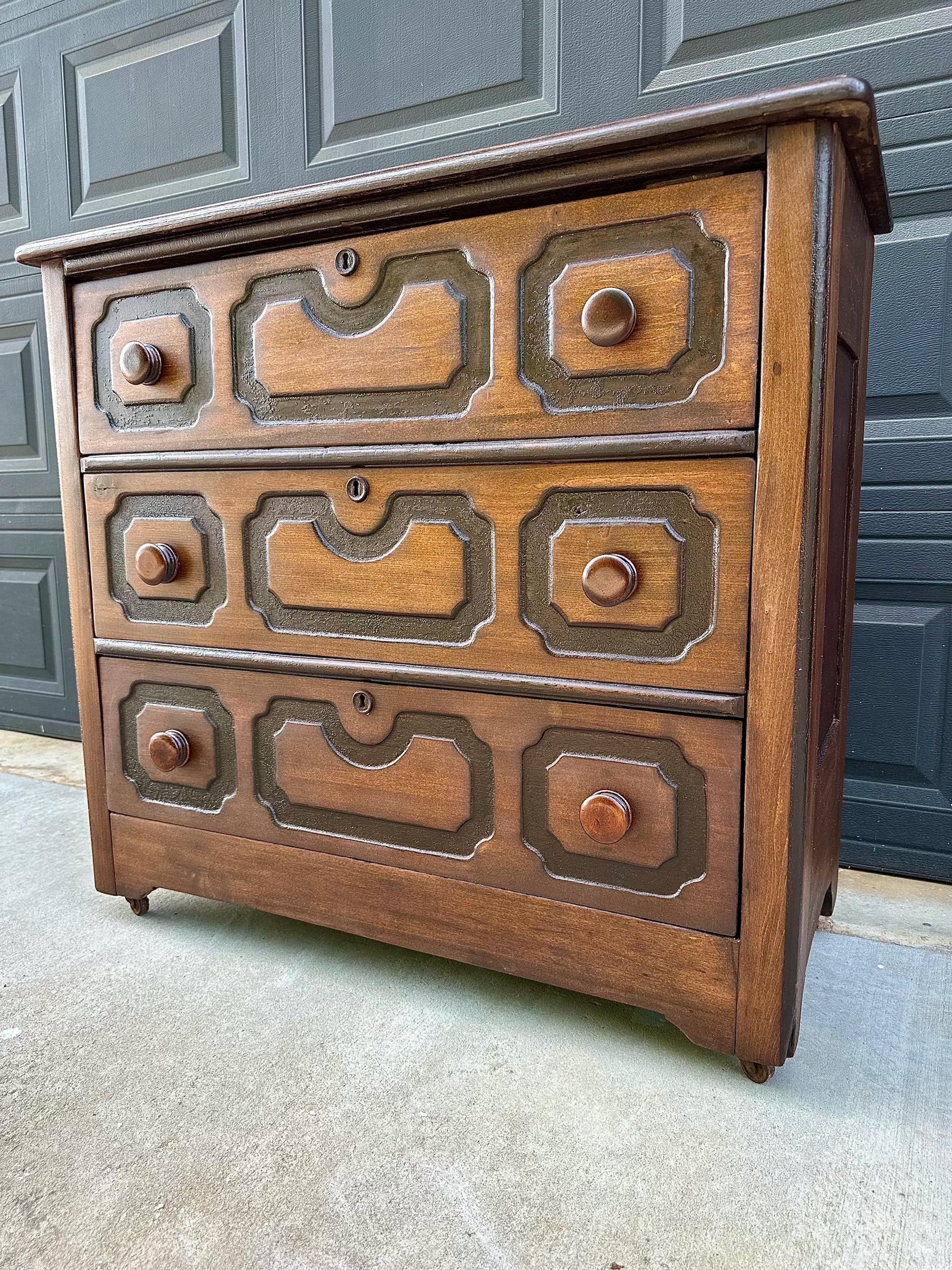 Vintage Late 19th Century Solid Wood Carved Walnut Rustic Storage Dresser on Casters