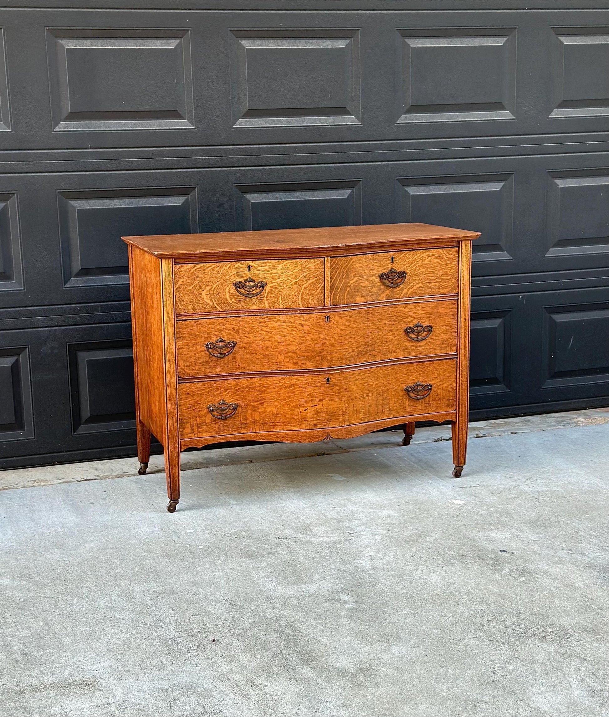 Antique Late 19th C Quarter Sawn Oak Curved Front Four Drawer Chest on Casters