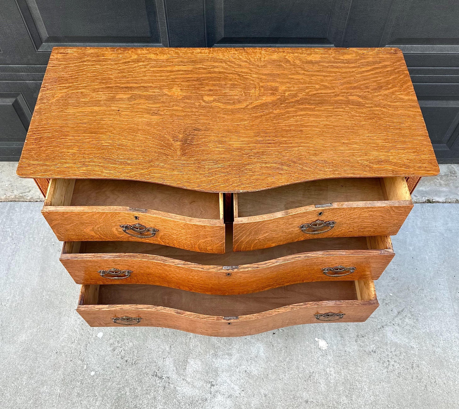 Antique Late 19th C Quarter Sawn Oak Curved Front Four Drawer Chest on Casters