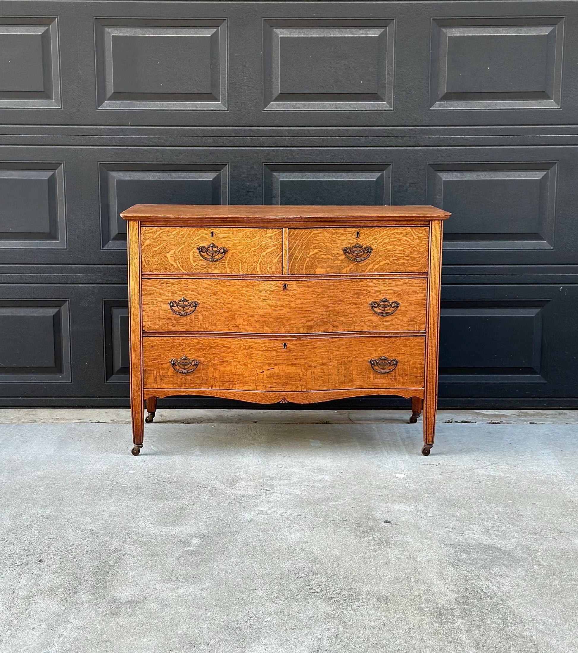Antique Late 19th C Quarter Sawn Oak Curved Front Four Drawer Chest on Casters