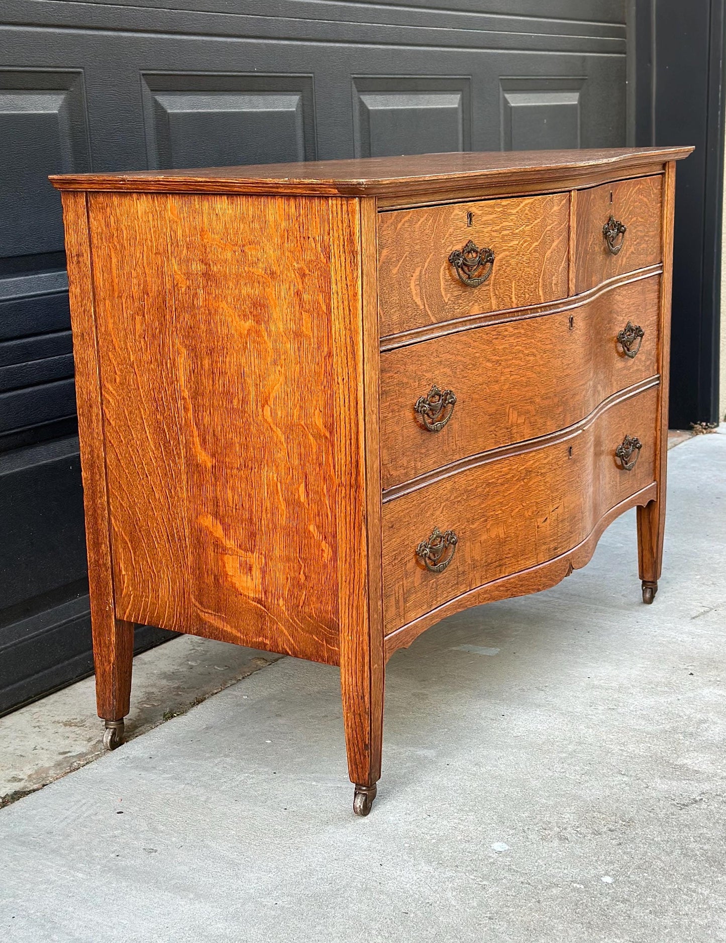 Antique Late 19th C Quarter Sawn Oak Curved Front Four Drawer Chest on Casters