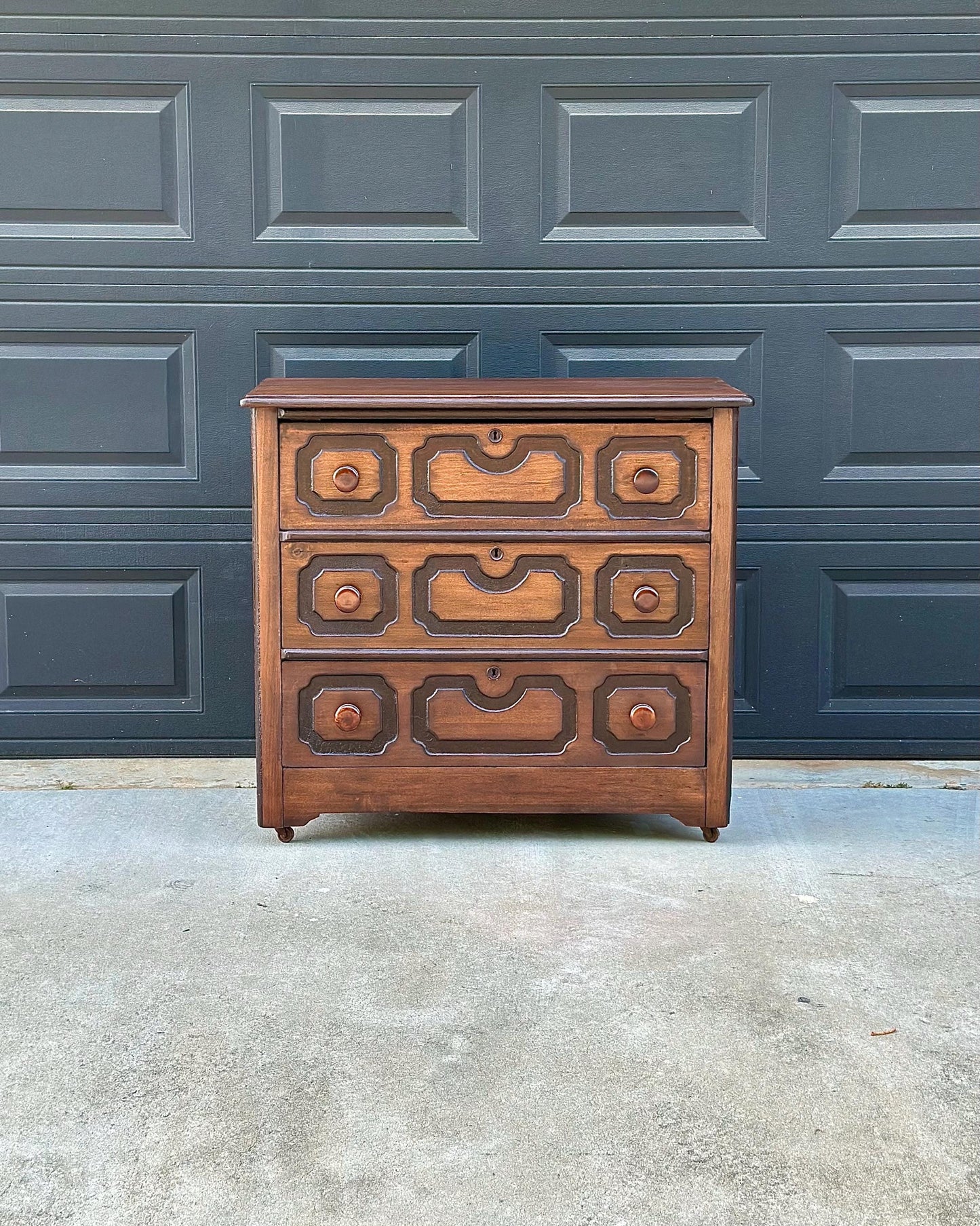 Vintage Late 19th Century Solid Wood Carved Walnut Rustic Storage Dresser on Casters