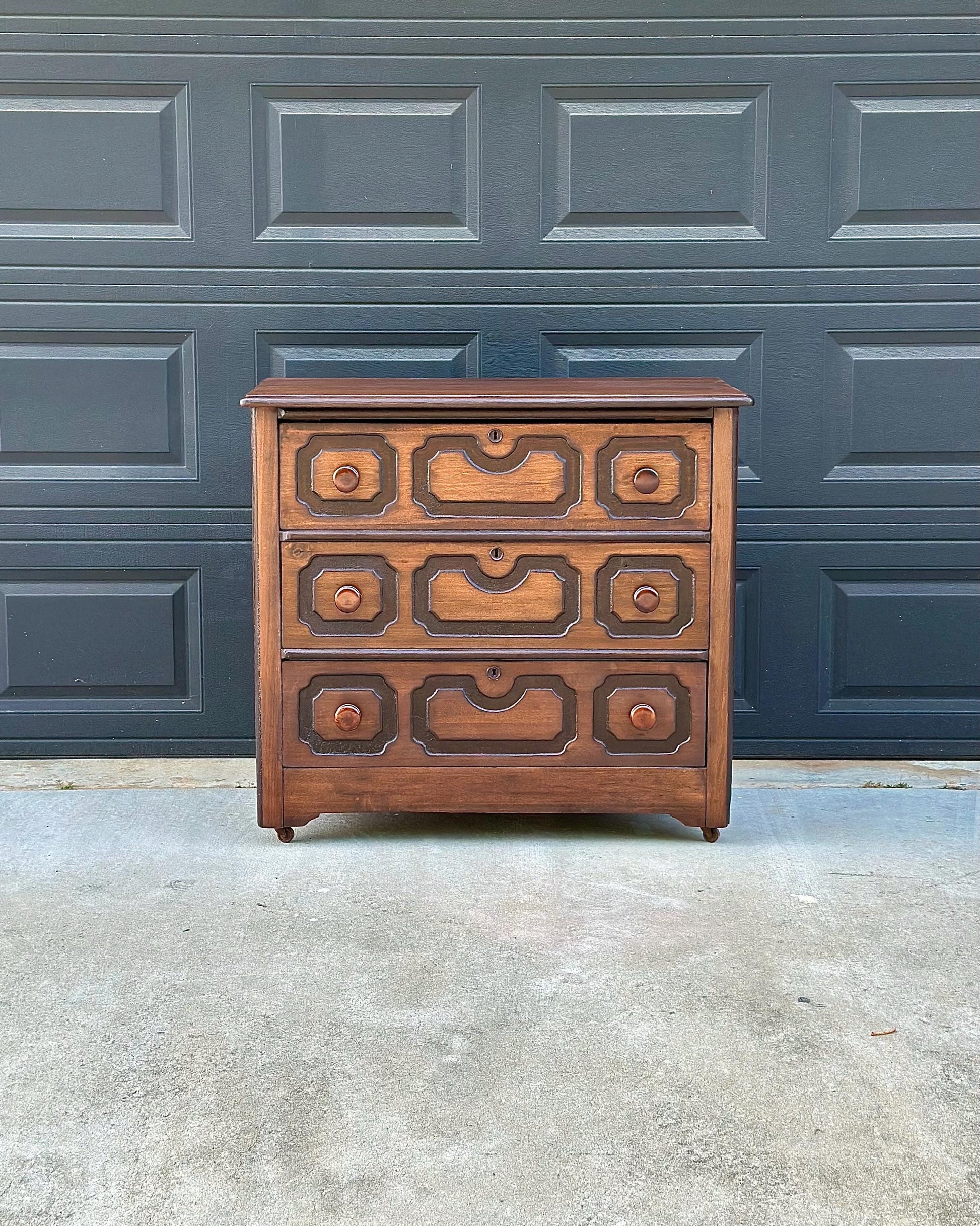 Vintage Late 19th Century Solid Wood Carved Walnut Rustic Storage Dresser on Casters