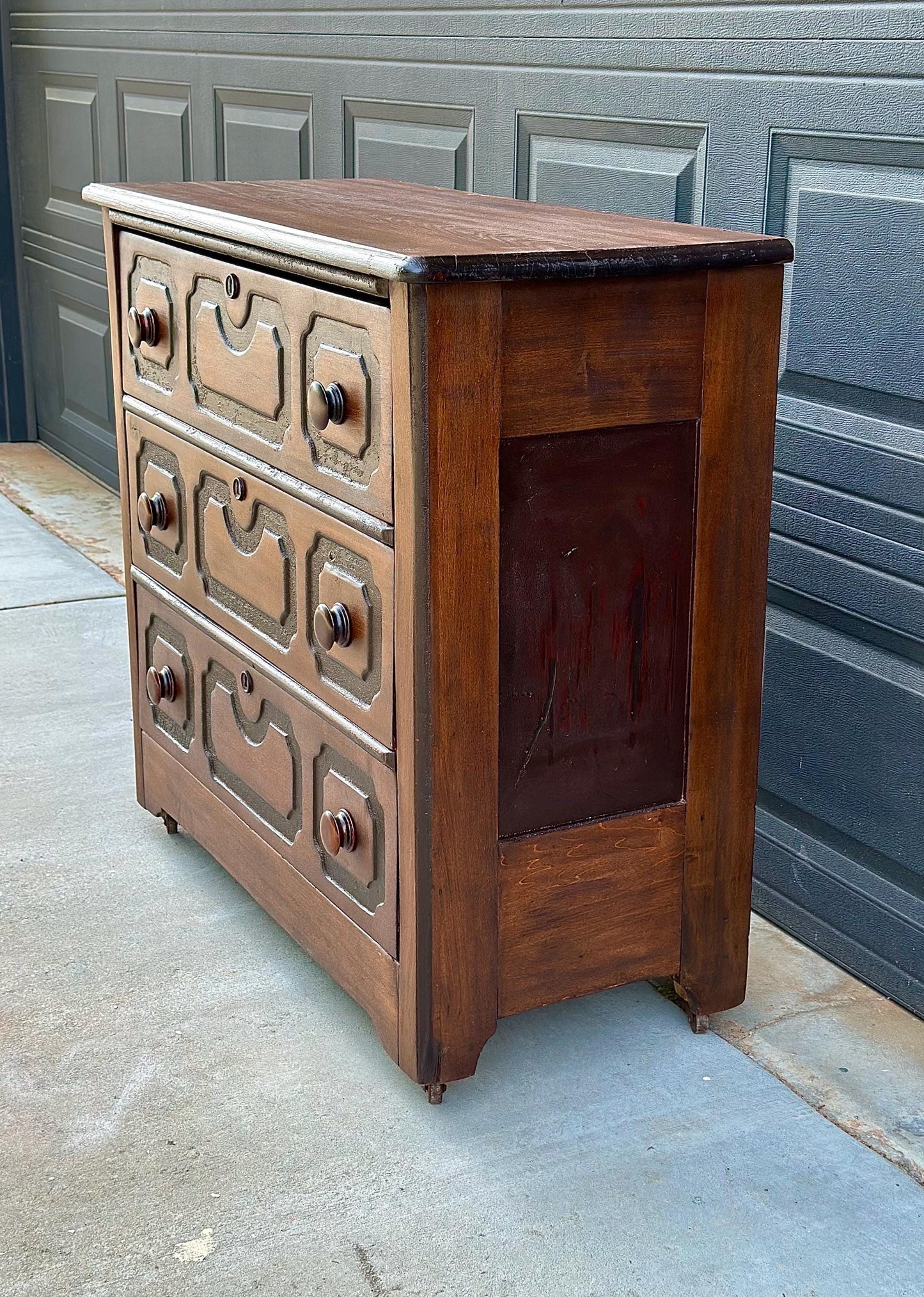 Vintage Late 19th Century Solid Wood Carved Walnut Rustic Storage Dresser on Casters