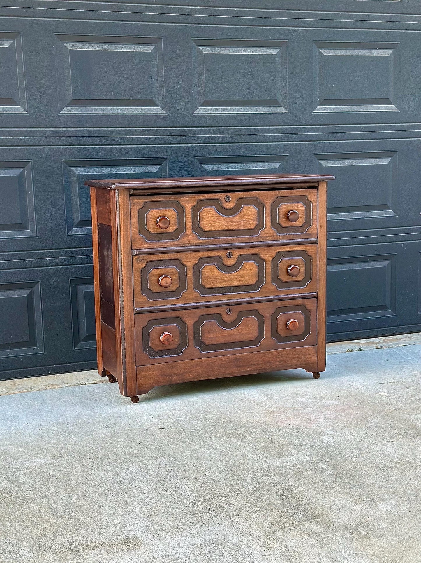 Vintage Late 19th Century Solid Wood Carved Walnut Rustic Storage Dresser on Casters