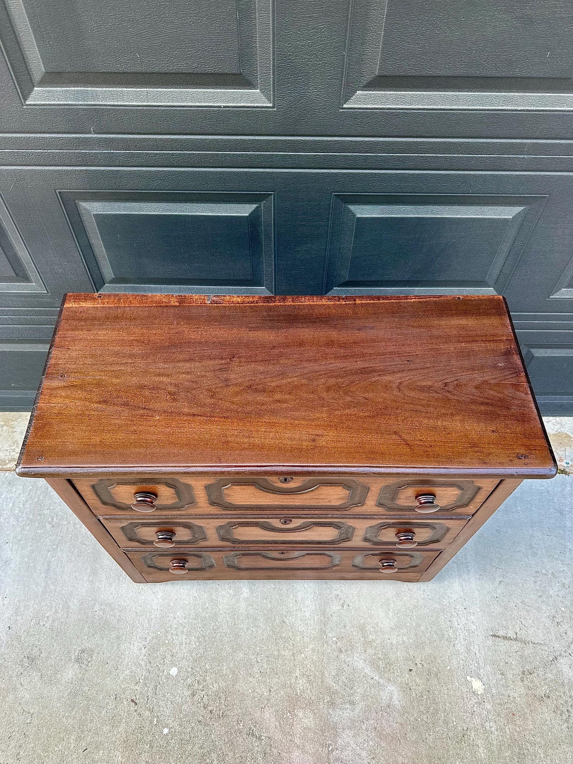 Vintage Late 19th Century Solid Wood Carved Walnut Rustic Storage Dresser on Casters