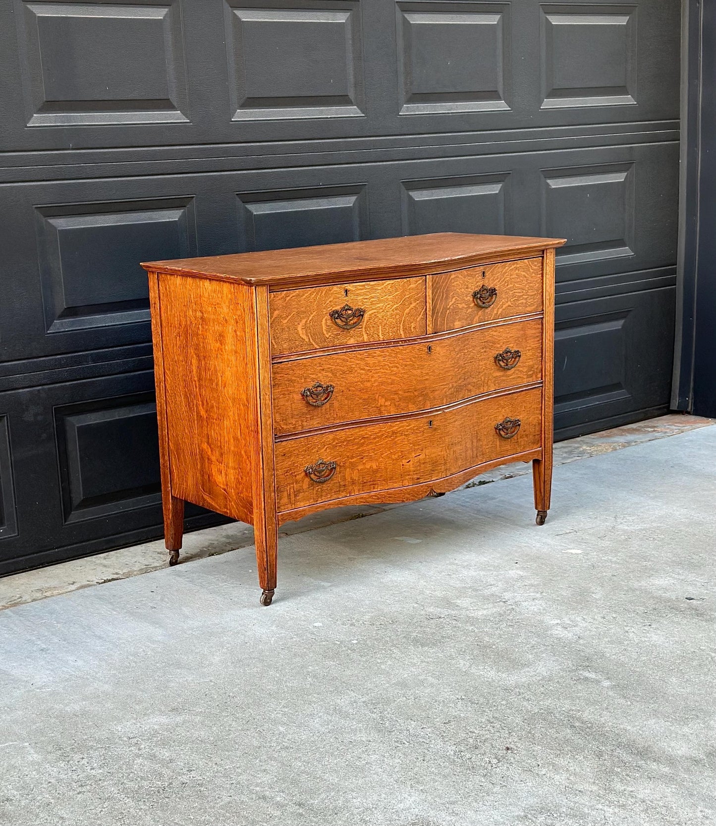 Antique Late 19th C Quarter Sawn Oak Curved Front Four Drawer Chest on Casters