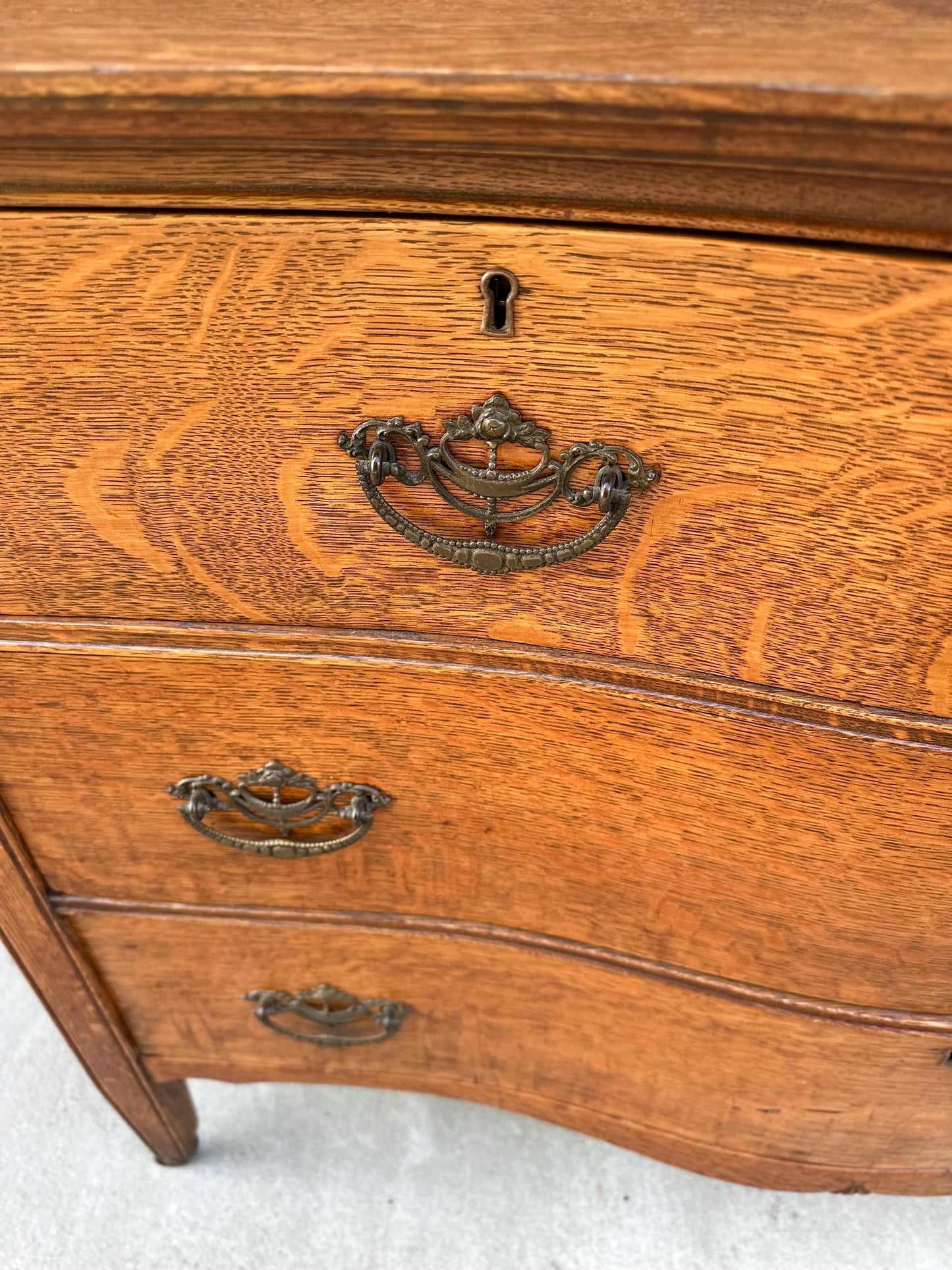 Antique Late 19th C Quarter Sawn Oak Curved Front Four Drawer Chest on Casters