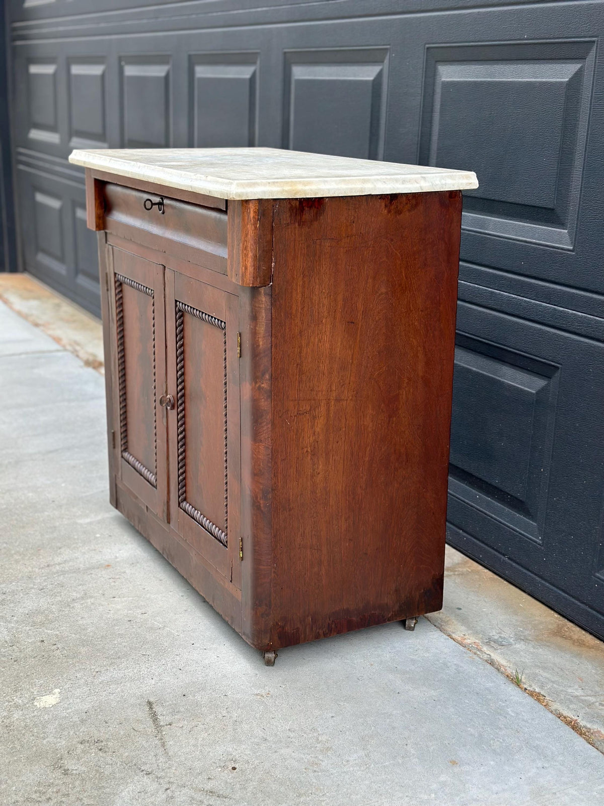 Antique Mid-19th C Marble Top Flame Mahogany Cabinet on Brass Casters (30" Wide)