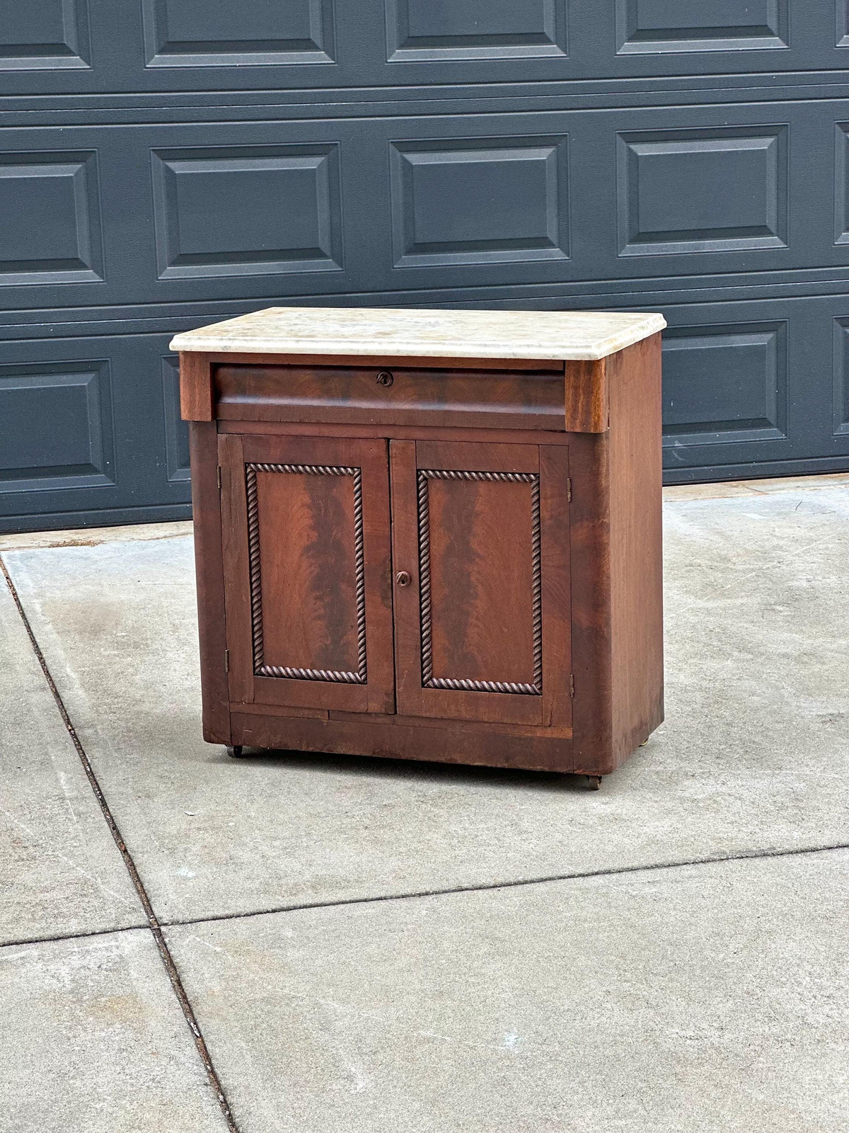 Antique Mid-19th C Marble Top Flame Mahogany Cabinet on Brass Casters (30" Wide)