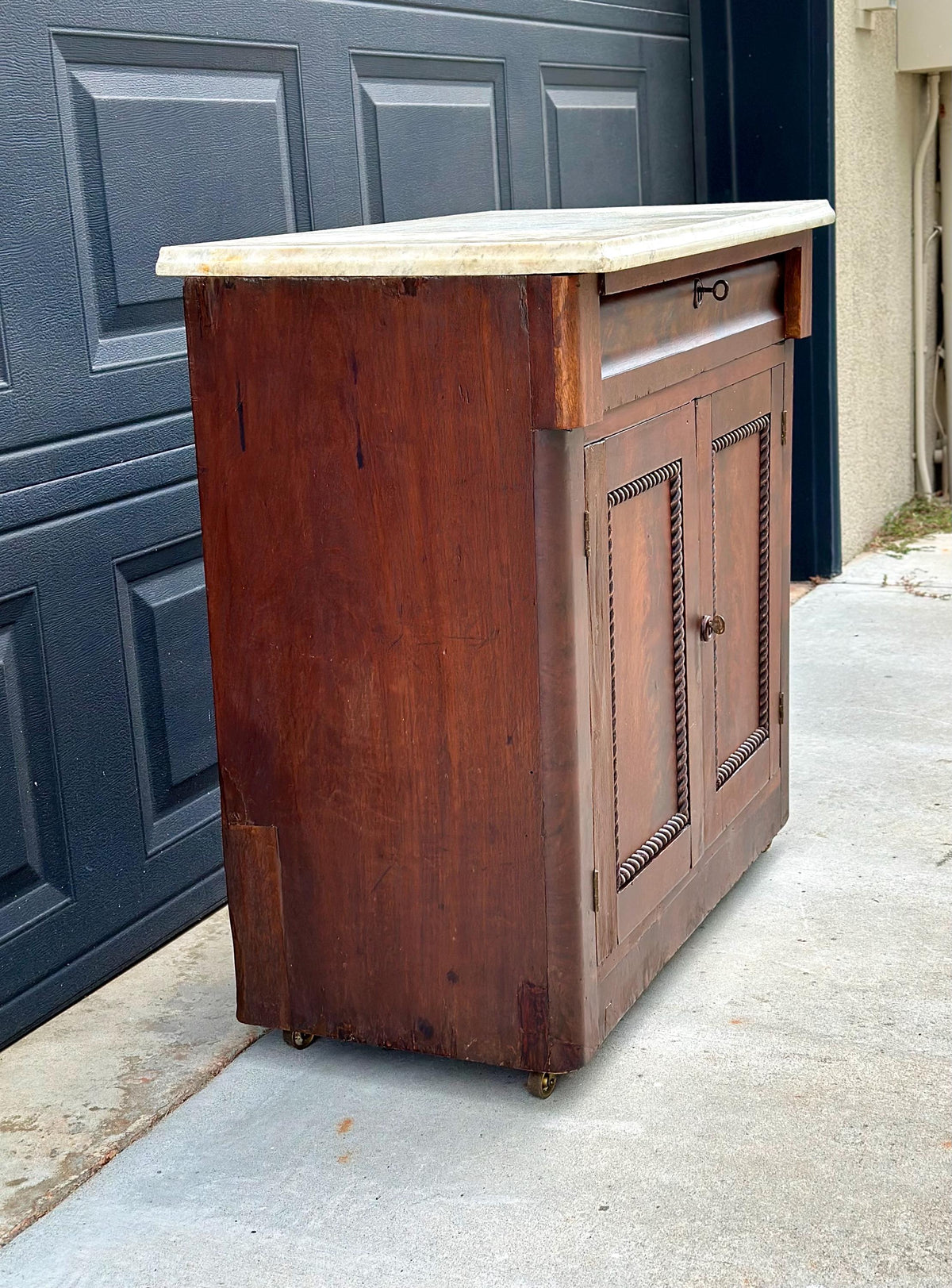 Antique Mid-19th C Marble Top Flame Mahogany Cabinet on Brass Casters (30" Wide)