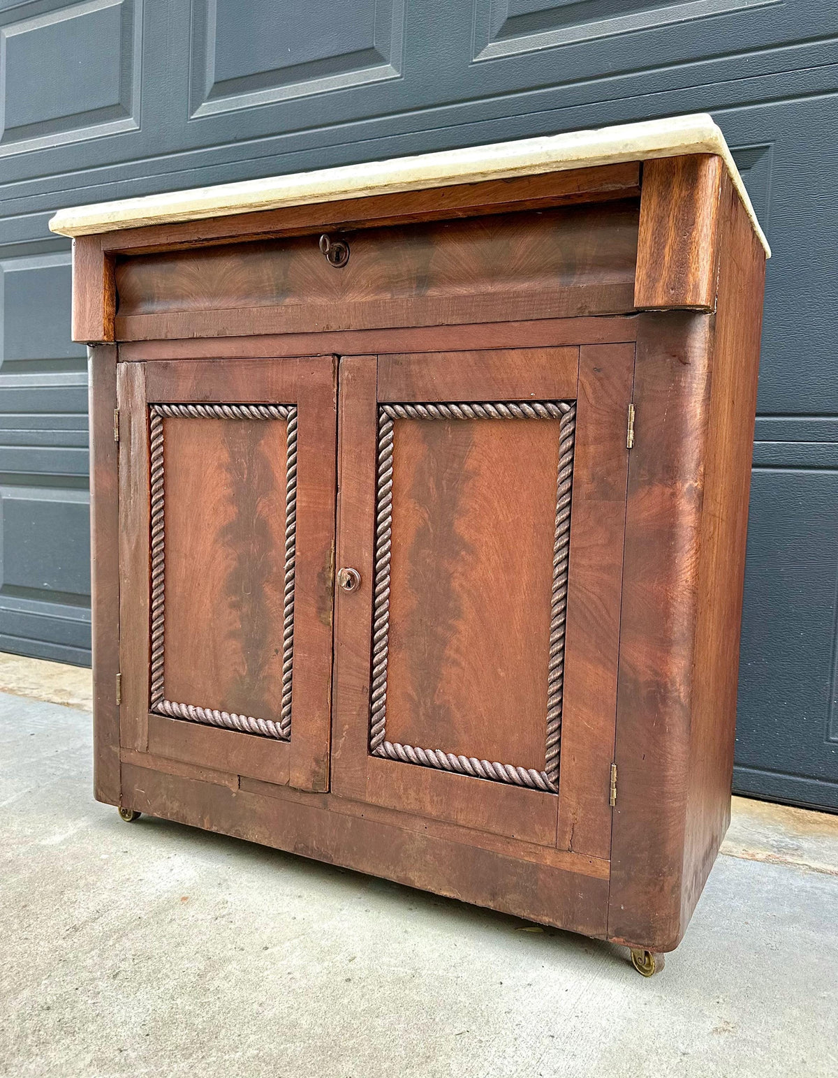 Antique Mid-19th C Marble Top Flame Mahogany Cabinet on Brass Casters (30" Wide)