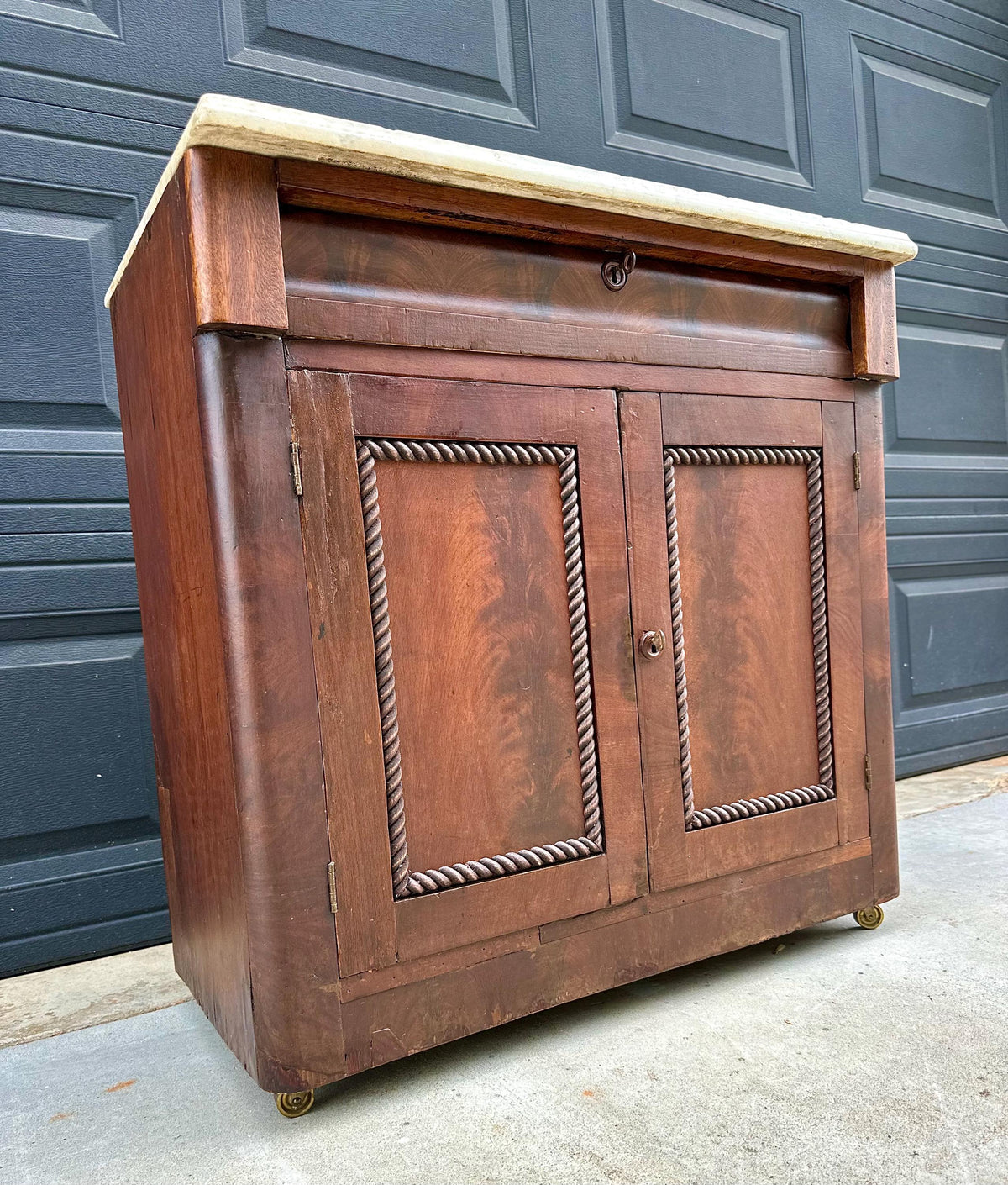 Antique Mid-19th C Marble Top Flame Mahogany Cabinet on Brass Casters (30" Wide)