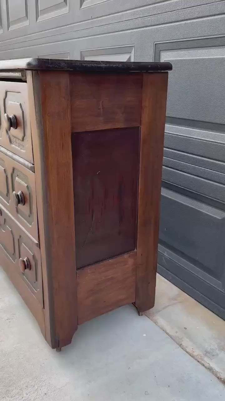 Vintage Late 19th Century Solid Wood Carved Walnut Rustic Storage Dresser on Casters